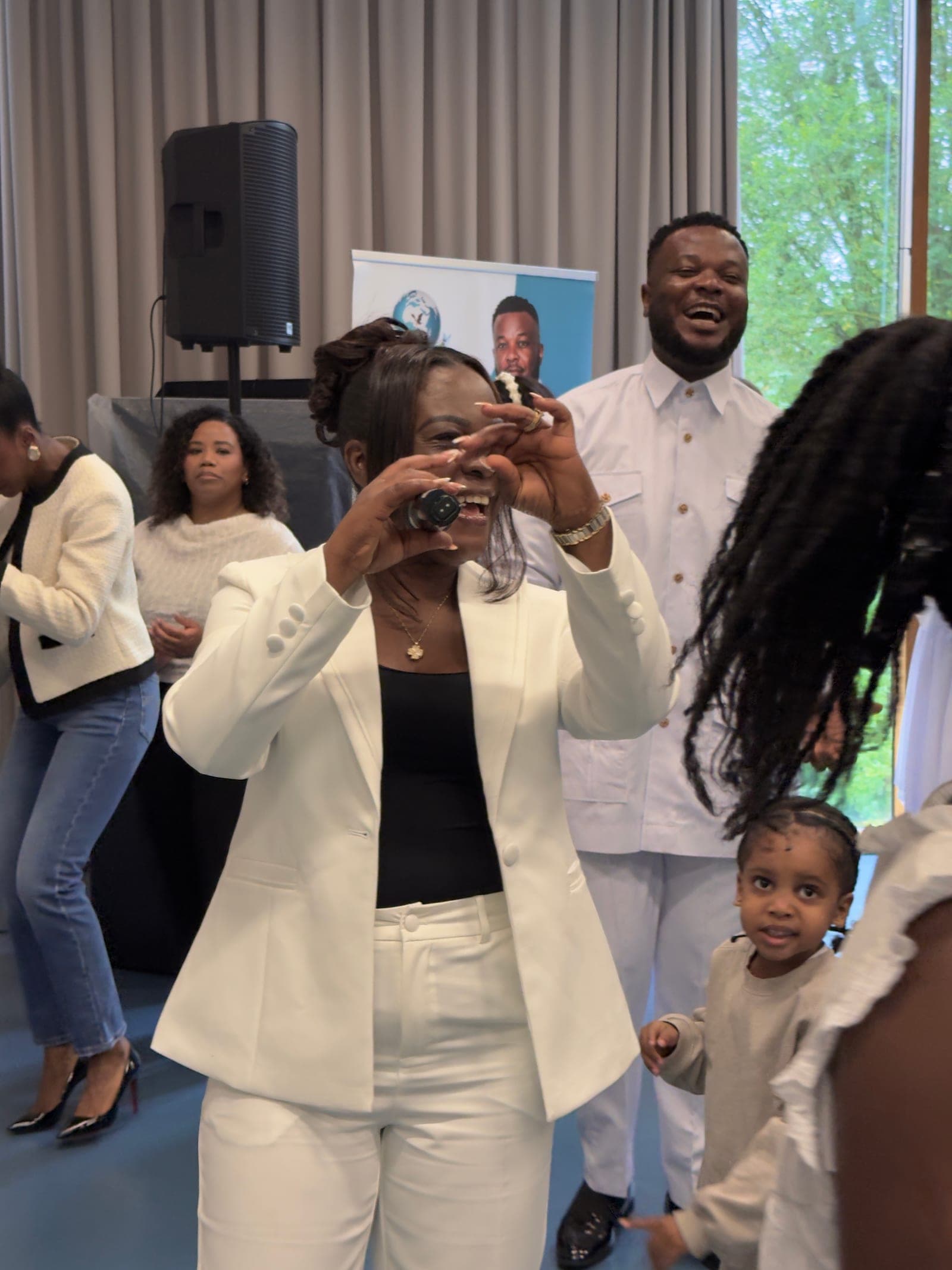 Members celebrating together after a service