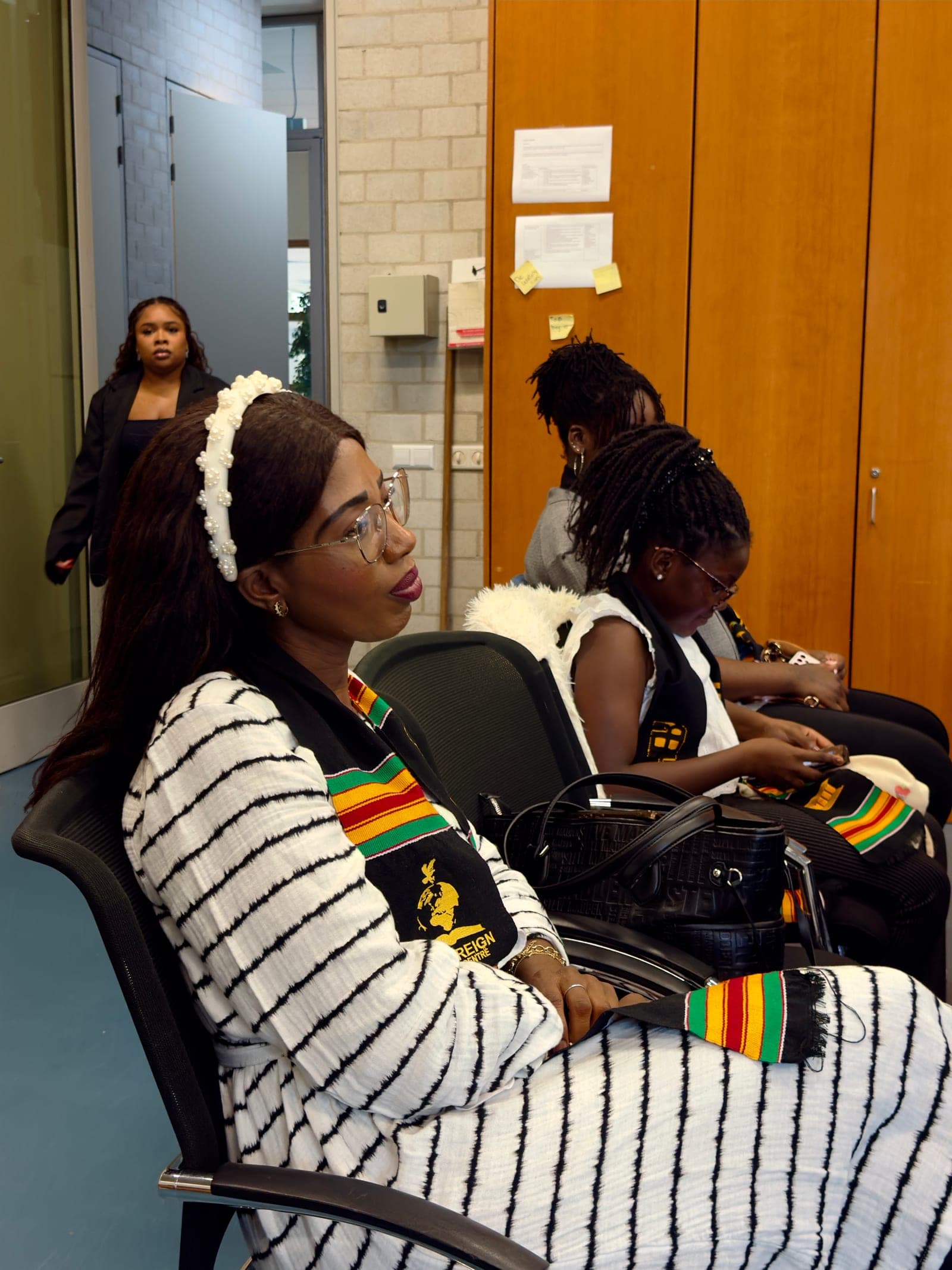 Members of the congregation listening closely