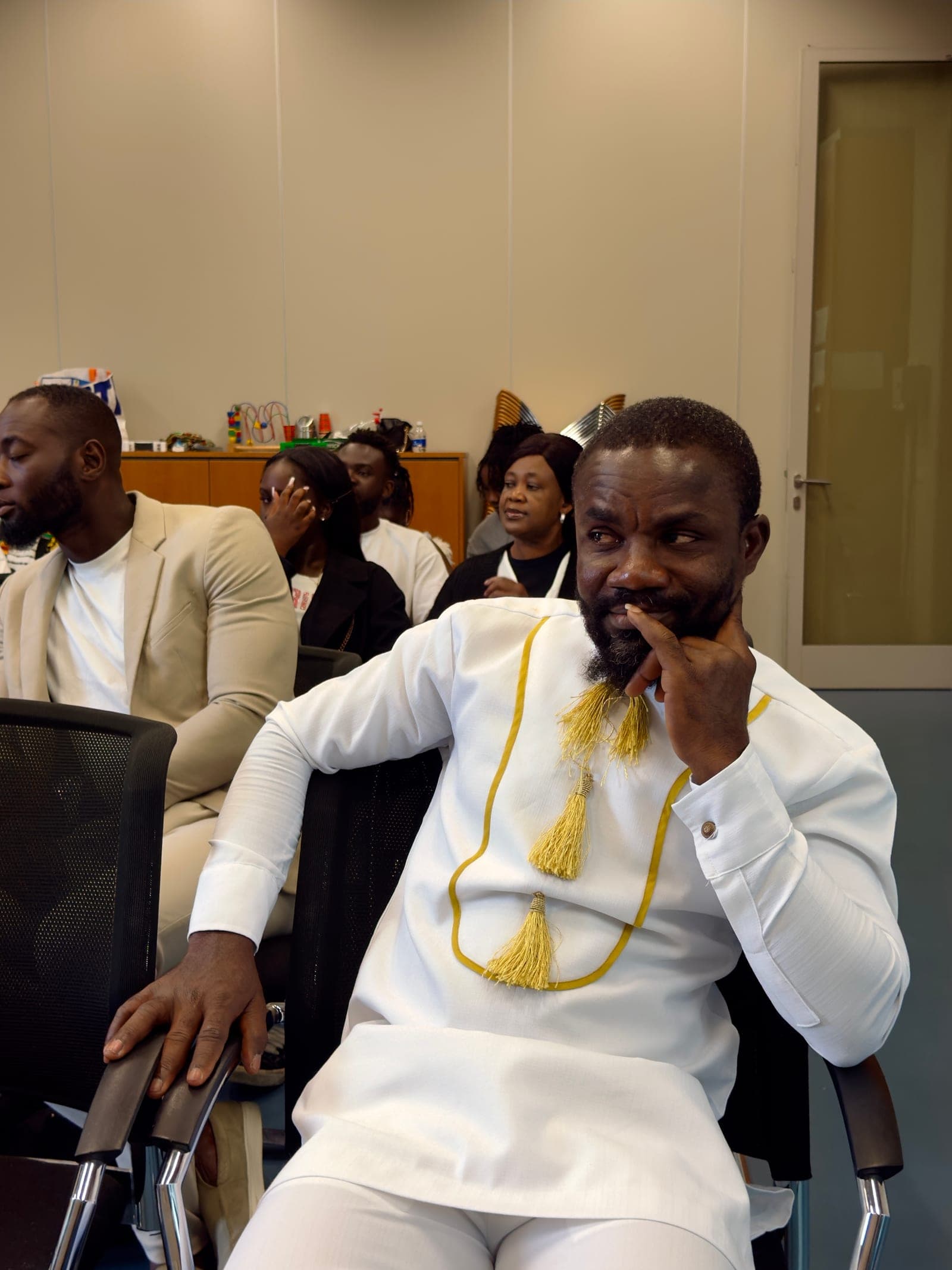 The congregation seated and listening during a service